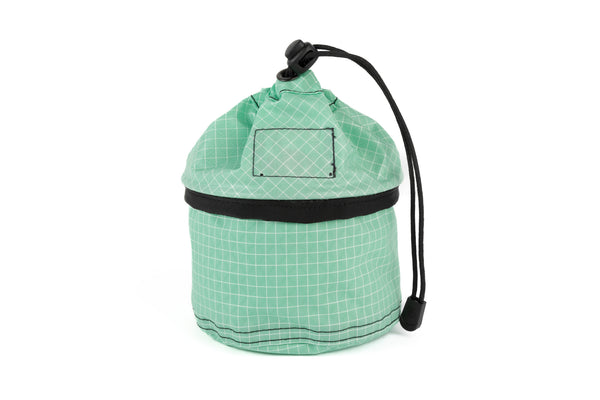A Small Travel Tray in Seafoam (green with white grid) 200 Halcyon cinched up.